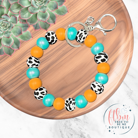 Turquoise & Orange Cow Silicone Bead Wristlet